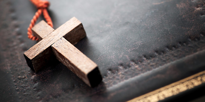 Christian Cross on Bible